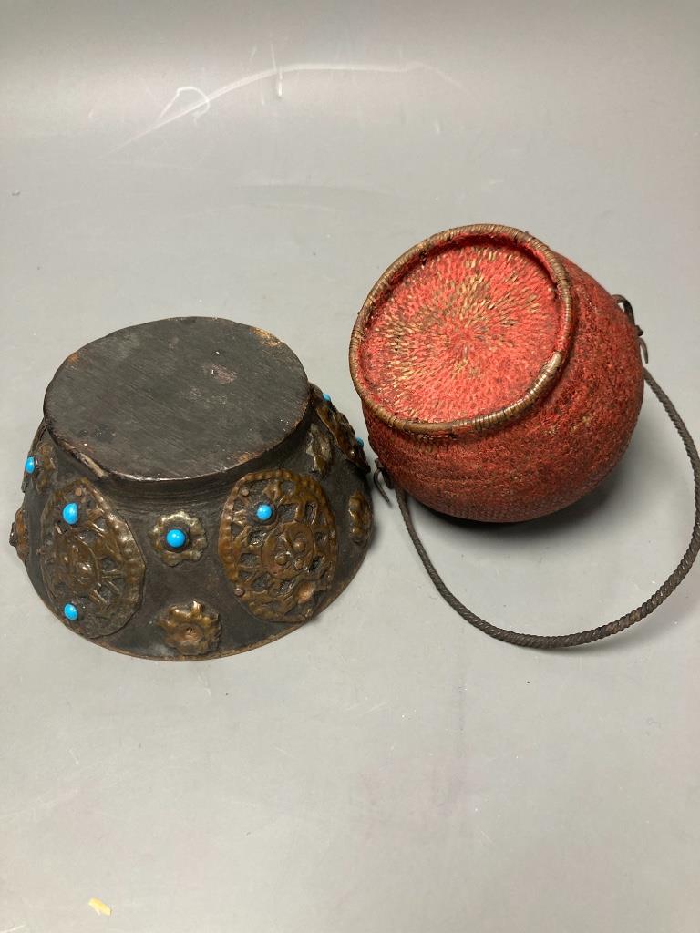 A Tibetan wooden bowl, diameter 13cm and a woven lidded basket